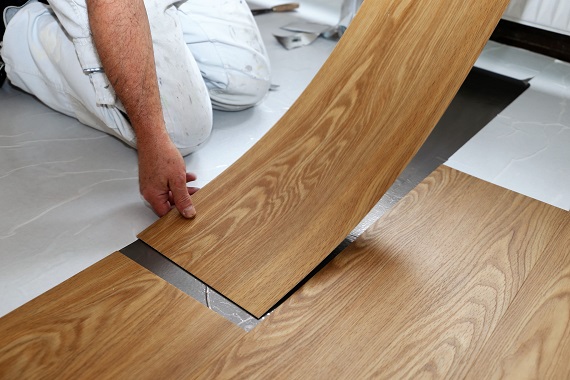 72308303 - man laying floor pvc 72308303 - man laying floor pvc